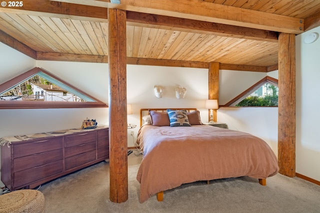 bedroom with multiple windows, light carpet, wooden ceiling, and beam ceiling