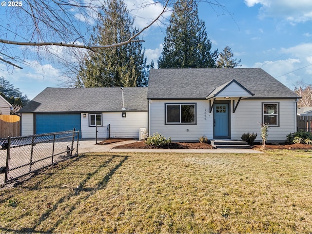 ranch-style house featuring a garage and a front yard