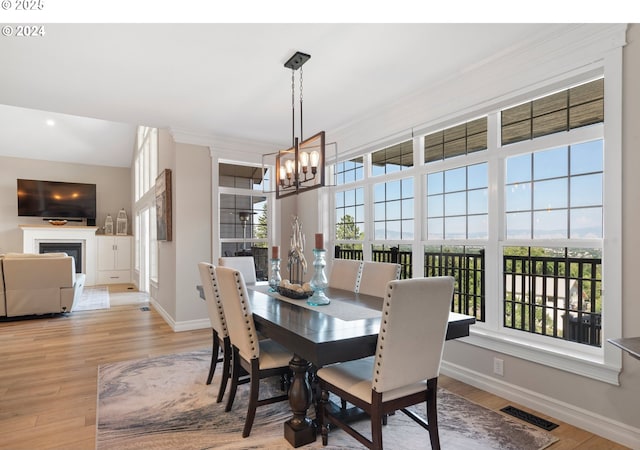 217 Deal Canyon Rd, La Grande, OR 97850 - dining area with baseboards, a chandelier, healthy amount of natural light, wood finished floors, and recessed lighting