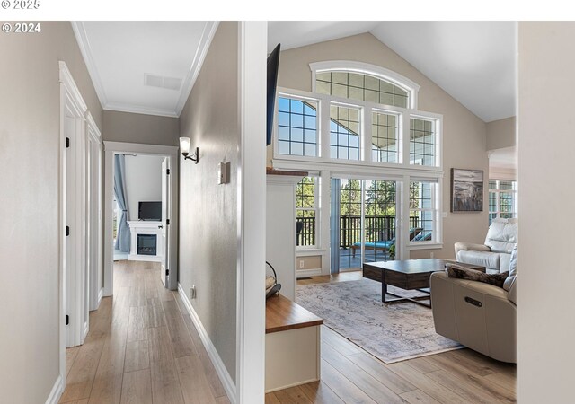 217 Deal Canyon Rd, La Grande, OR 97850 - corridor with light wood-style flooring, healthy amount of natural light, lofted ceiling, and baseboards
