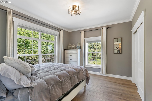 217 Deal Canyon Rd, La Grande, OR 97850 - bedroom featuring baseboards, wood finished floors, and ornamental molding