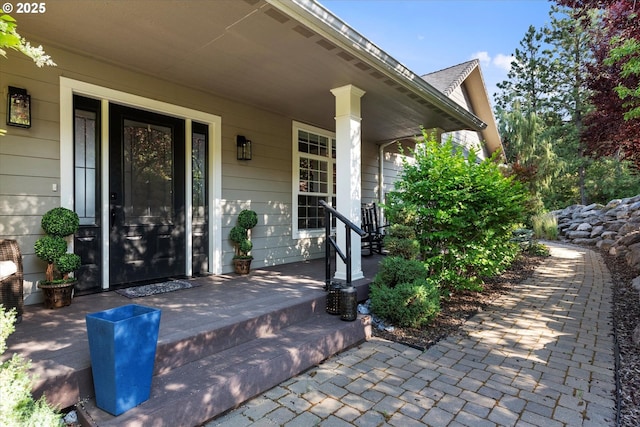 217 Deal Canyon Rd, La Grande, OR 97850 - doorway to property featuring covered porch