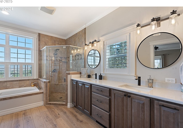 217 Deal Canyon Rd, La Grande, OR 97850 - bathroom with a stall shower, double vanity, crown molding, and a bath