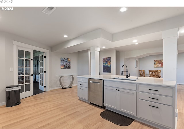 217 Deal Canyon Rd, La Grande, OR 97850 - kitchen featuring a sink, dishwasher, light wood-type flooring, baseboards, and recessed lighting