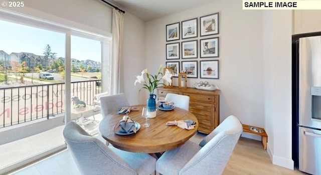 7510 NW Elise Ave, Portland, OR 97229 - dining space featuring baseboards and light wood-style floors