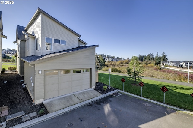 exterior space featuring driveway