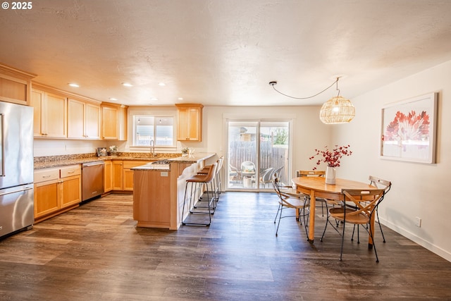 2250 Jeppesen Acres Rd, Eugene, OR 97401 - kitchen featuring stainless steel appliances, healthy amount of natural light, a peninsula, light brown cabinetry, and recessed lighting