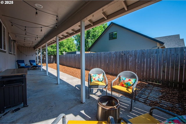 2250 Jeppesen Acres Rd, Eugene, OR 97401 - fenced backyard featuring a patio area and an outdoor fire pit
