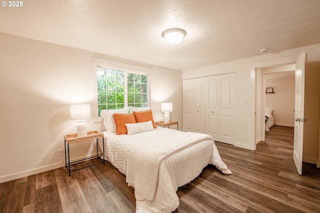 2250 Jeppesen Acres Rd, Eugene, OR 97401 - bedroom featuring wood finished floors, a closet, and baseboards