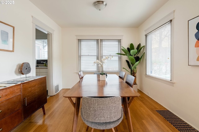 dining room featuring light hardwood / wood-style floors