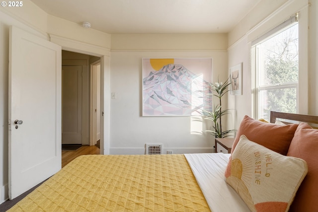 bedroom featuring hardwood / wood-style floors