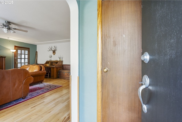 interior space featuring ceiling fan and wood-type flooring