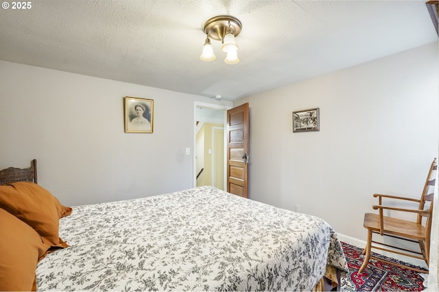 bedroom featuring a textured ceiling