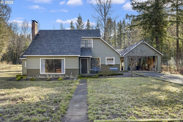 view of front of house with a front lawn