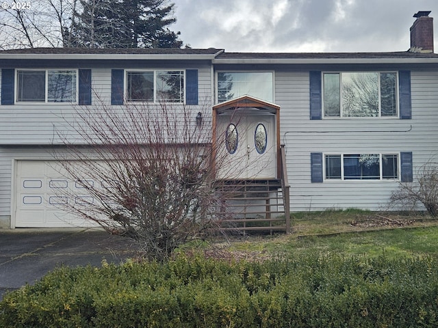 raised ranch with a garage