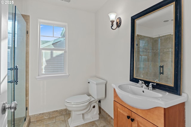 bathroom with toilet, a shower with door, and vanity