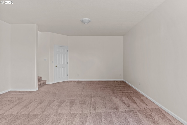 unfurnished room featuring carpet floors