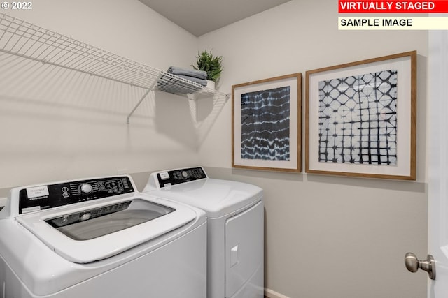 laundry area featuring laundry area and separate washer and dryer