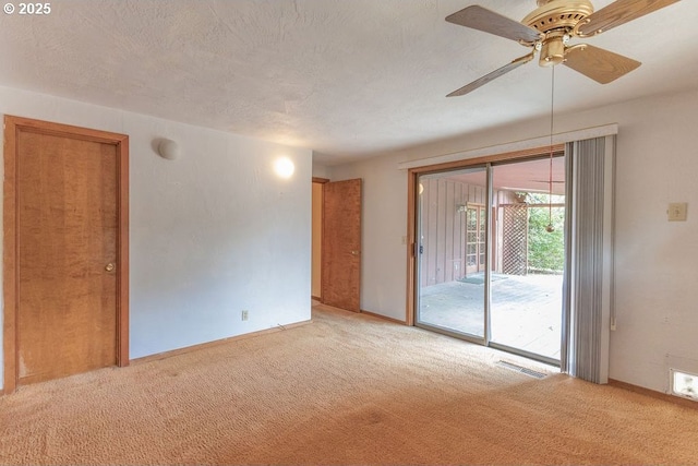 2116 Sally Way, Eugene, OR 97401 - carpeted empty room with ceiling fan and a textured ceiling