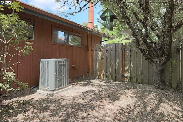 2116 Sally Way, Eugene, OR 97401 - view of property exterior featuring a central air condition unit and board and batten siding