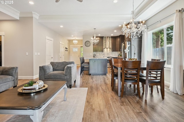 655 Schemmel Ln, Silverton, OR 97381 - dining space featuring a chandelier, light wood-style floors, ornamental molding, recessed lighting, and ceiling fan