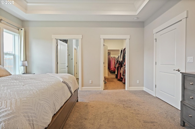 655 Schemmel Ln, Silverton, OR 97381 - carpeted bedroom with crown molding, a tray ceiling, a spacious closet, and a closet