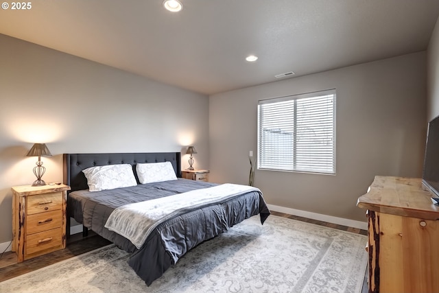 bedroom with wood-type flooring