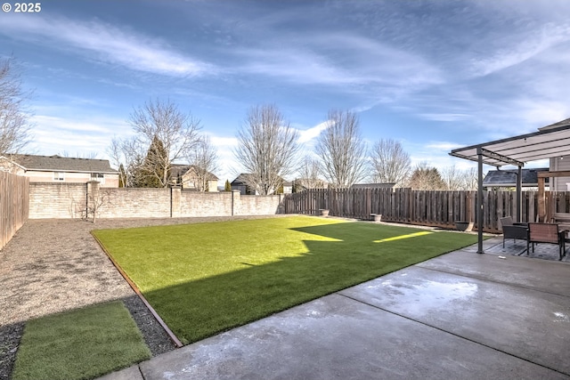 view of yard with a pergola and a patio area