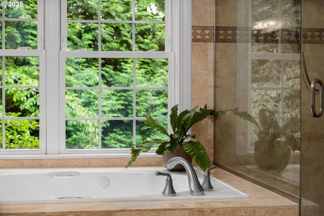 4503 NW 147th Ave, Portland, OR 97229 - bathroom featuring a garden tub and tiled shower