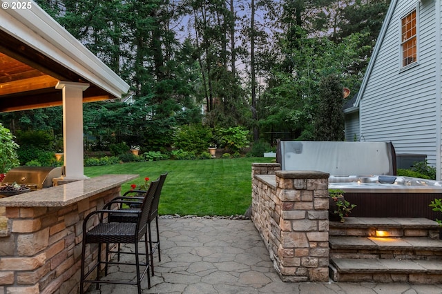 4503 NW 147th Ave, Portland, OR 97229 - view of patio with a hot tub, view of wooded area, and a grill