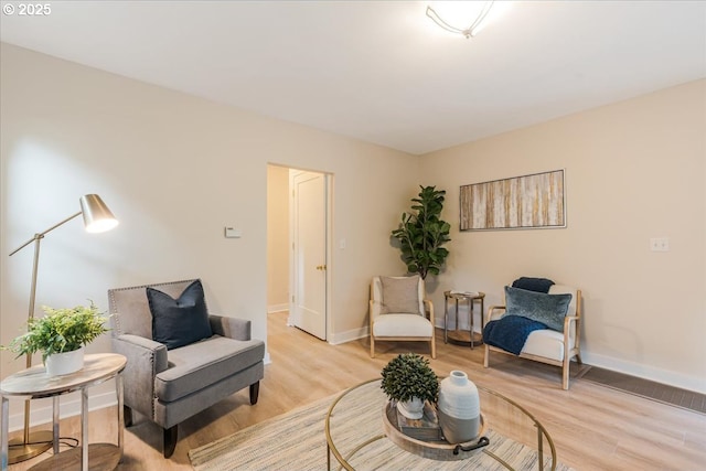 1716 N Rosa Parks Way, Portland, OR 97217 - living area featuring baseboards and light wood-style flooring