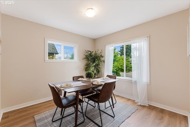 1716 N Rosa Parks Way, Portland, OR 97217 - dining space with light wood-type flooring and baseboards