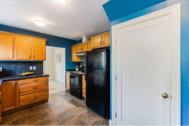 1716 N Rosa Parks Way, Portland, OR 97217 - kitchen with black appliances, dark countertops, decorative backsplash, under cabinet range hood, and brown cabinets