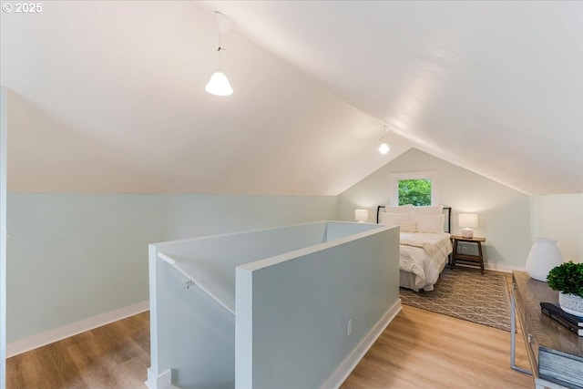 1716 N Rosa Parks Way, Portland, OR 97217 - bedroom featuring lofted ceiling, light wood finished floors, and baseboards