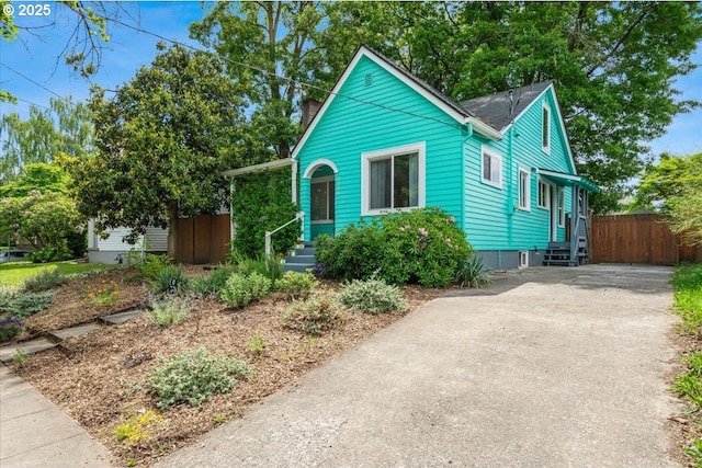 1716 N Rosa Parks Way, Portland, OR 97217 - bungalow featuring entry steps and driveway