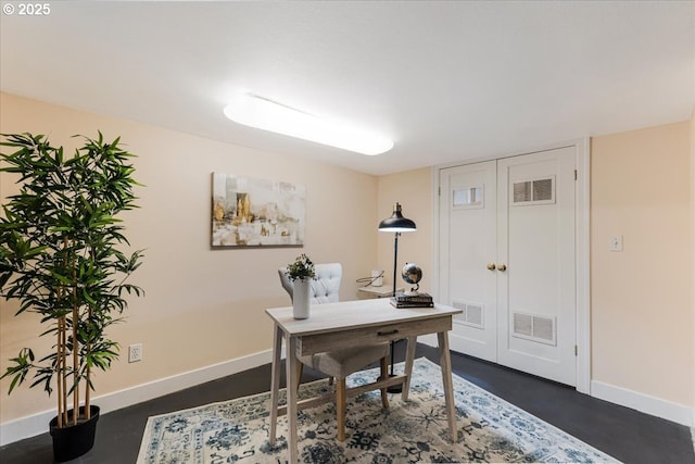 1716 N Rosa Parks Way, Portland, OR 97217 - home office with baseboards and concrete flooring