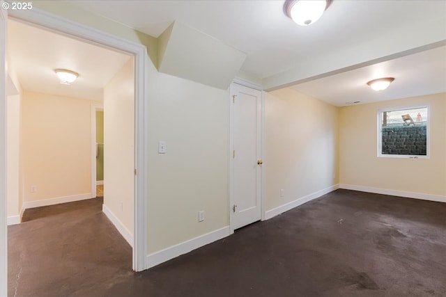 1716 N Rosa Parks Way, Portland, OR 97217 - empty room featuring finished concrete flooring and baseboards