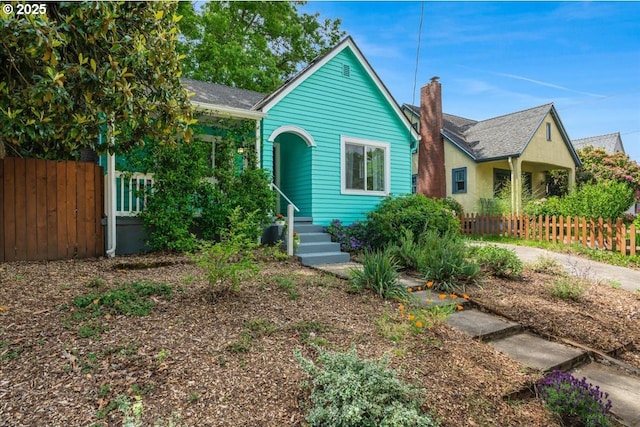 1716 N Rosa Parks Way, Portland, OR 97217 - view of front facade featuring a chimney