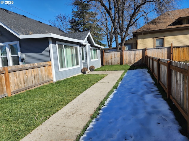 view of yard featuring a fenced backyard