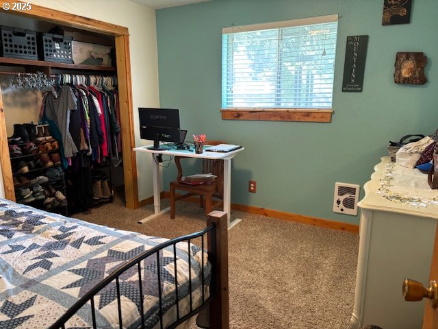34851 Seavey Loop Rd, Eugene, OR 97405 - carpeted bedroom featuring a closet and an office area