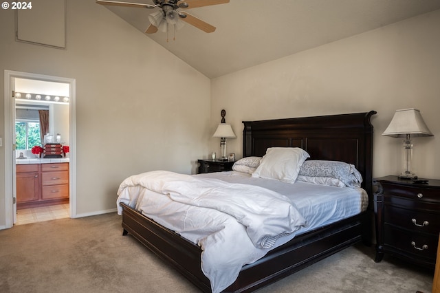 carpeted bedroom with connected bathroom, high vaulted ceiling, and ceiling fan