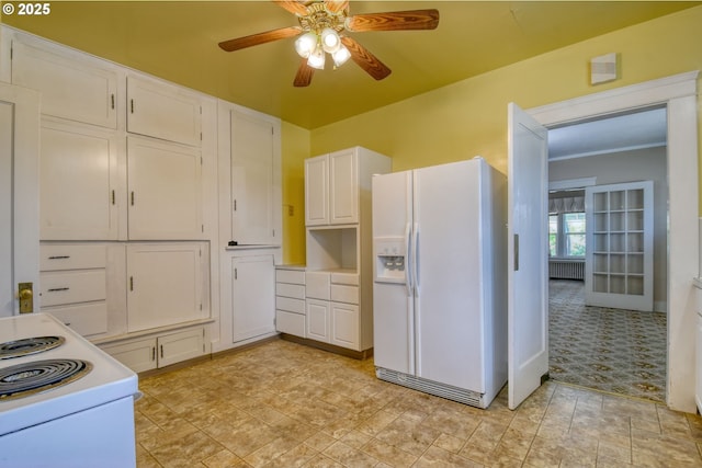 815 NW Bailey Ave, Pendleton, OR 97801 - kitchen with white appliances, white cabinetry, radiator, a ceiling fan, and light countertops