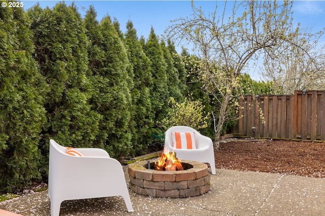 3816 NW Tustin Ranch Dr, Portland, OR 97229 - view of patio / terrace with fence and an outdoor fire pit