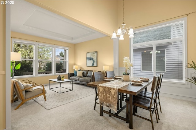 3816 NW Tustin Ranch Dr, Portland, OR 97229 - carpeted dining space with a chandelier
