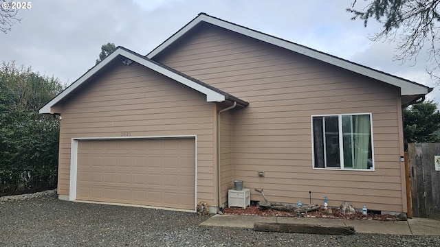 view of property exterior featuring a garage