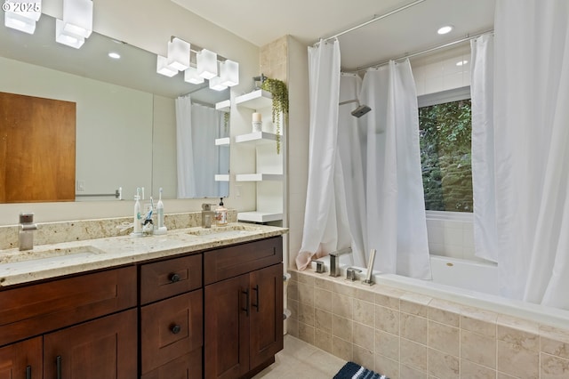 bathroom with shower / tub combo and vanity