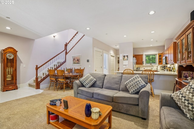 240 NE 5th St, Gresham, OR 97030 - living room with stairway, light colored carpet, and recessed lighting