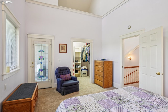 240 NE 5th St, Gresham, OR 97030 - carpeted bedroom with a walk in closet, a towering ceiling, and a closet