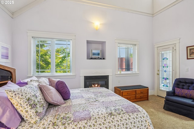 240 NE 5th St, Gresham, OR 97030 - carpeted bedroom with multiple windows, lofted ceiling, and a glass covered fireplace