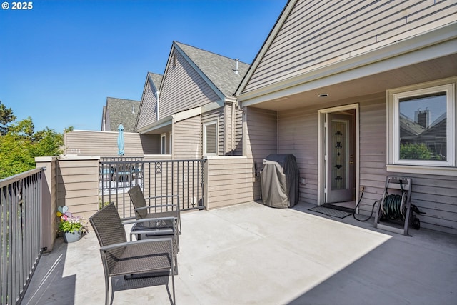 240 NE 5th St, Gresham, OR 97030 - view of patio featuring a balcony and a grill